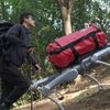 Unitree A2 carrying a load alongside a hiker